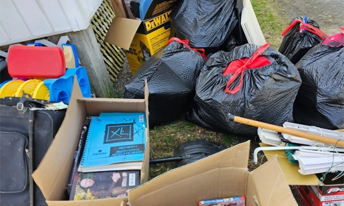 pile-of-junk-and-garbage-bags